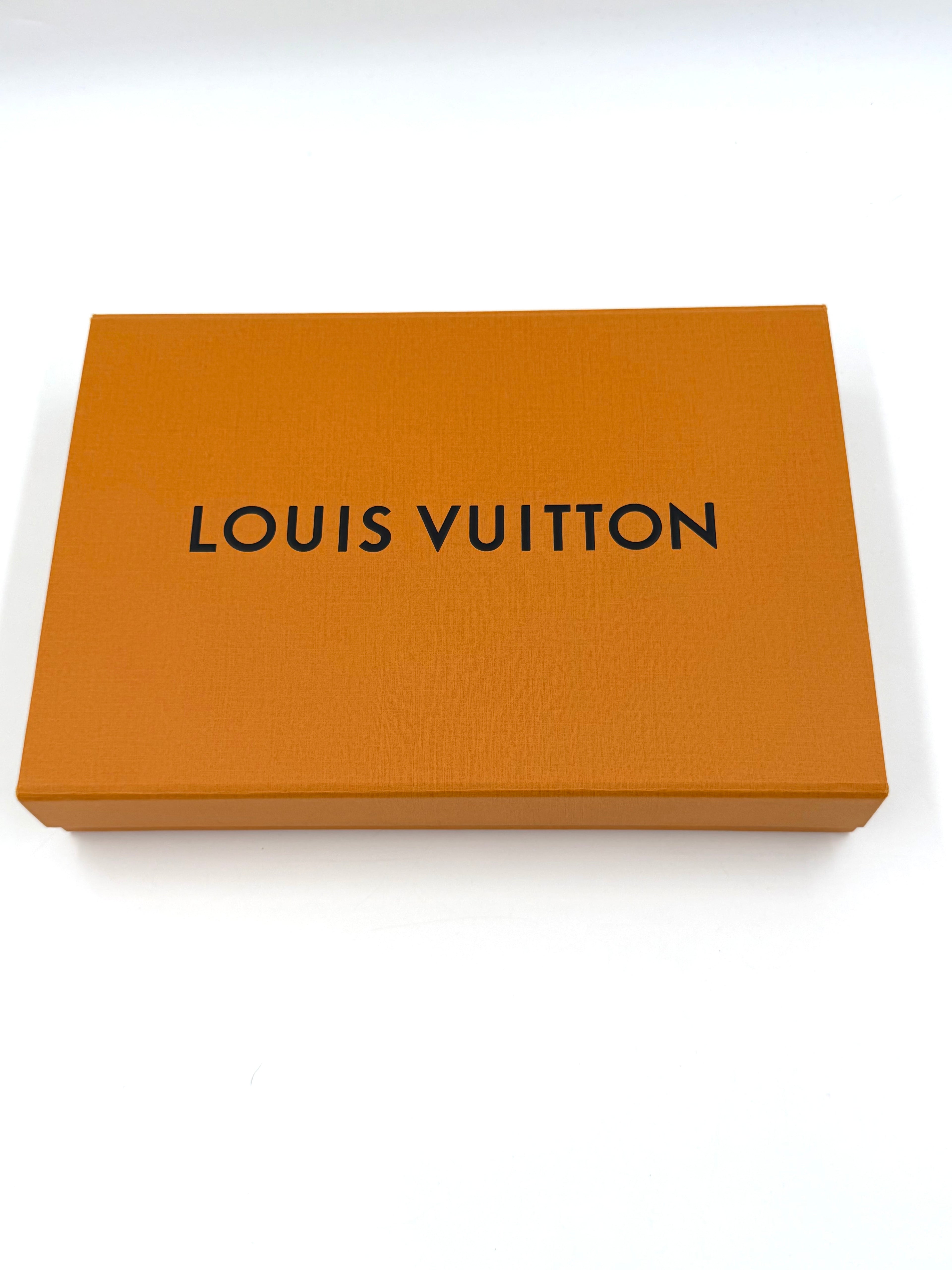 Pre-owned Louis Vuitton Pochette Coussin Black Embossed Lambskin Gold Hardware - Authenticated