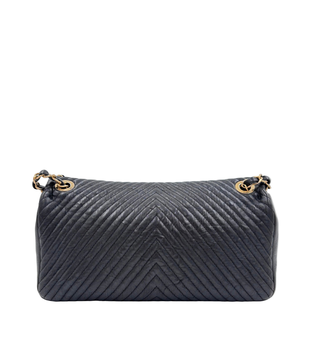 Pre-owned Chanel Medium Surpique Chevron Flap bag Black Gold-Tone Hardware - Authenticated