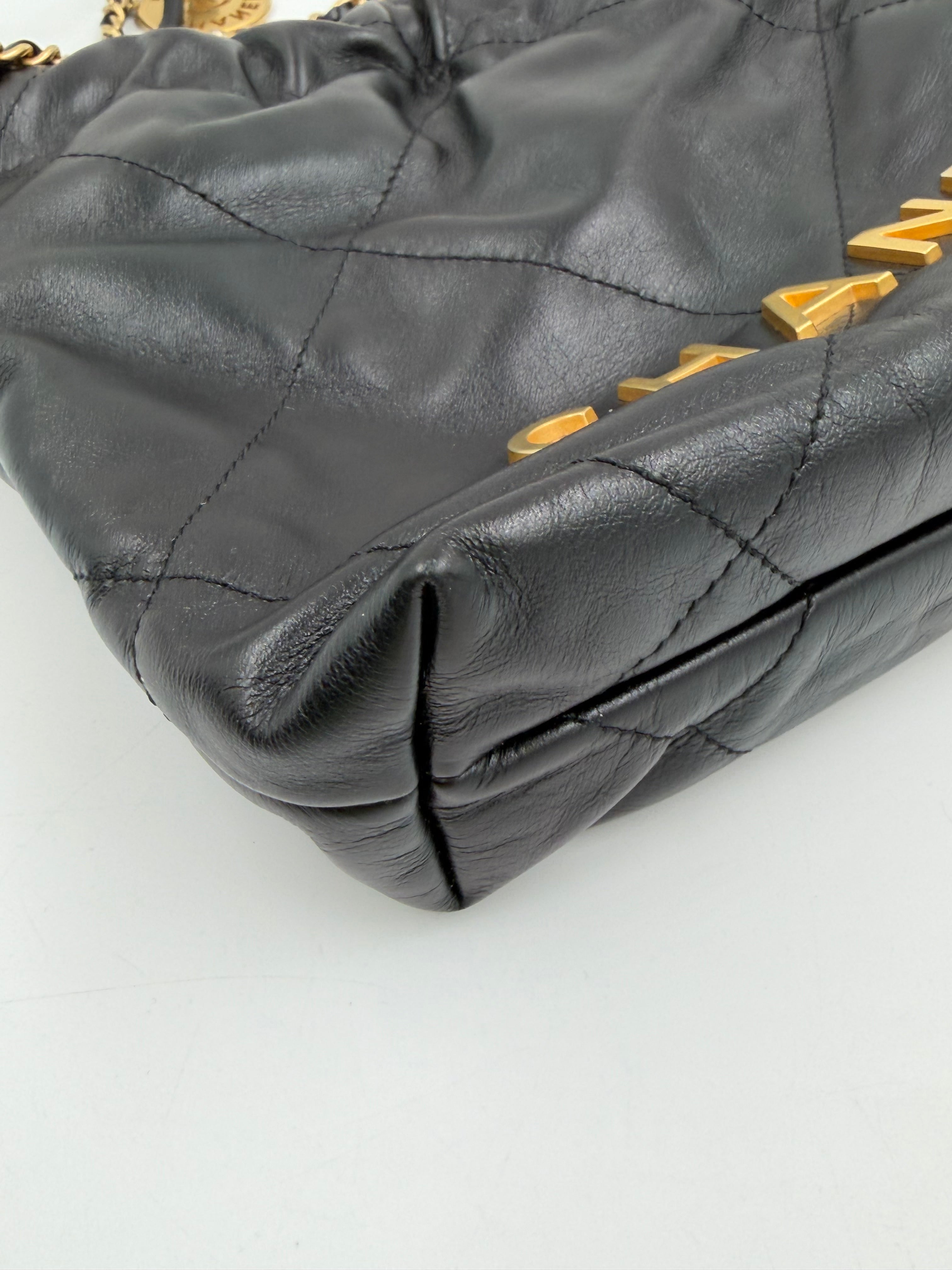 Pre-owned Chanel Shiny Calfskin Quilted Mini Chanel 22 Black Gold Hardware - Authenticated