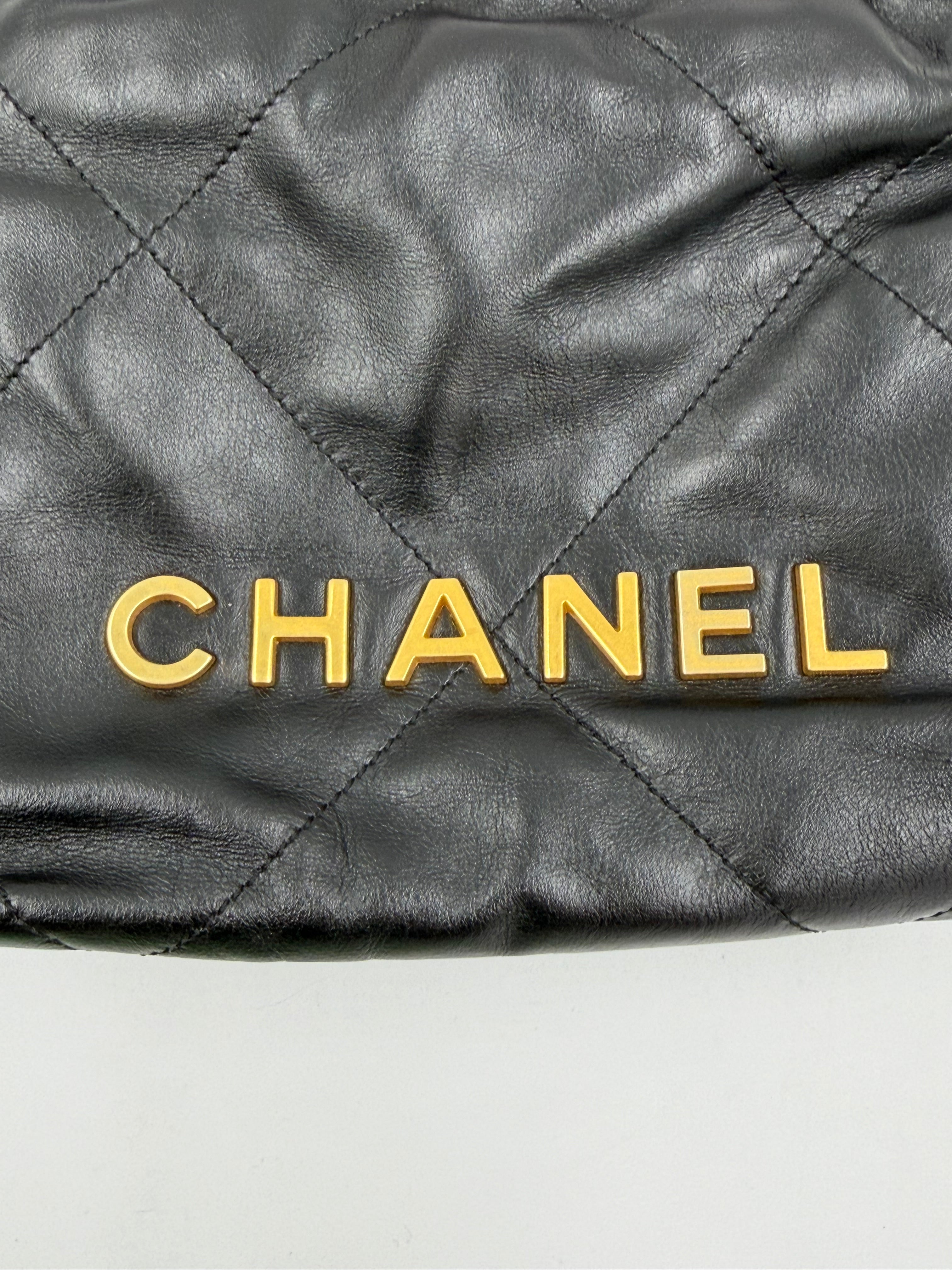 Pre-owned Chanel Shiny Calfskin Quilted Mini Chanel 22 Black Gold Hardware - Authenticated