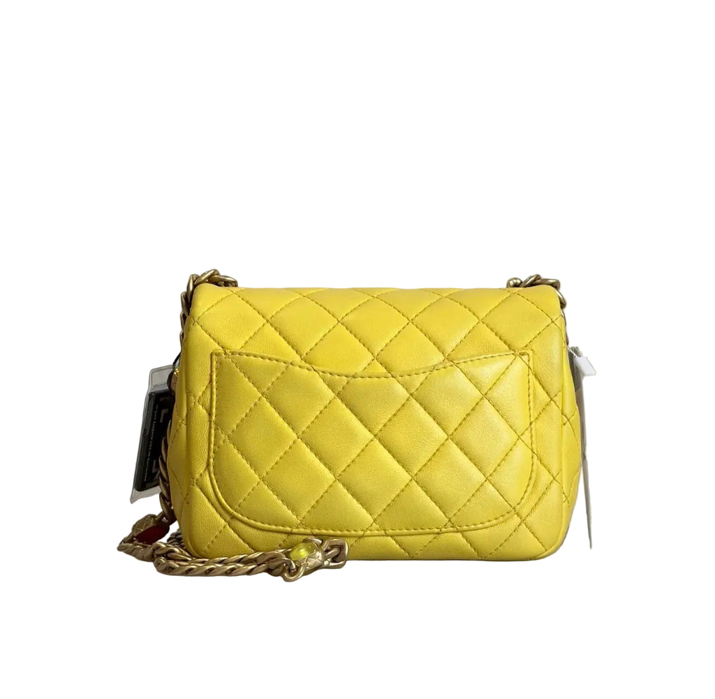 Pre-owned Chanel Yellow Leather Matelassé Handbag with Gem-Toned Charm Chain - Authenticated