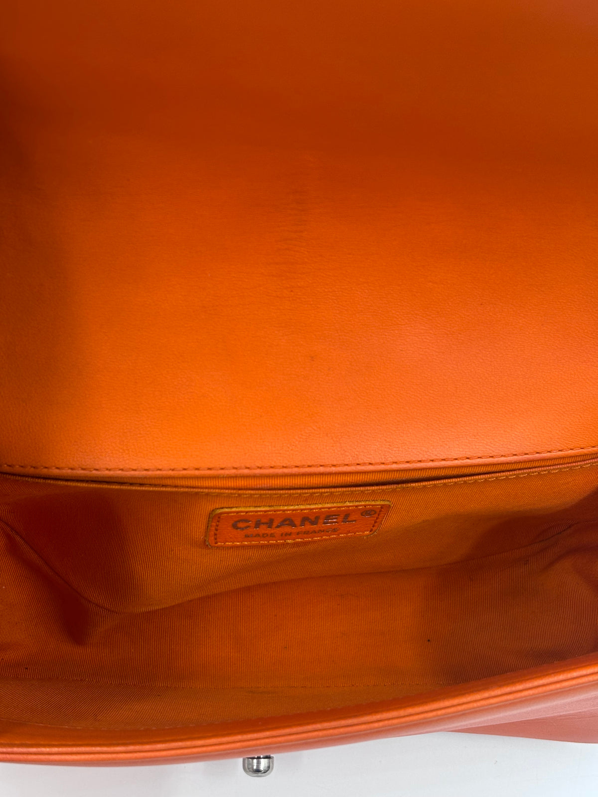 Pre-Owned Chanel Orange Boy Bag with Ruthenium Hardware Old Medium - Authenticated