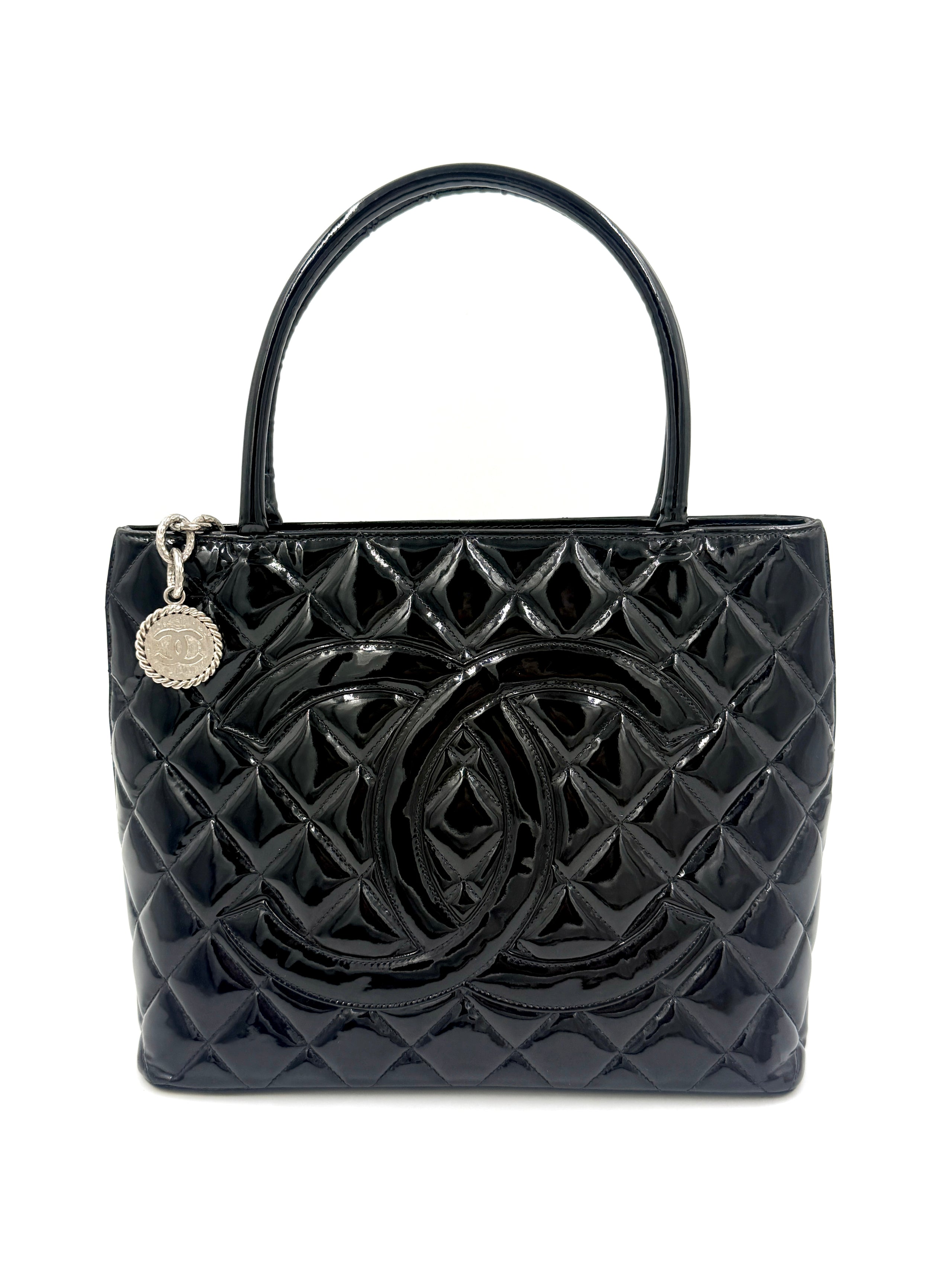 Pre-Owned Chanel Black Quilted Patent Leather Medallion Tote Bag with Silver Hardware - Authenticated