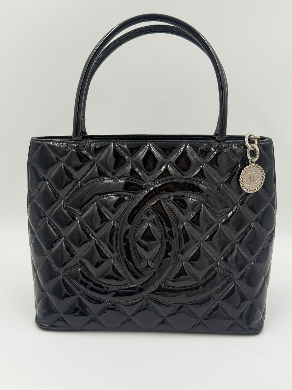 Pre-Owned Chanel Black Quilted Patent Leather Medallion Tote Bag with Silver Hardware - Authenticated