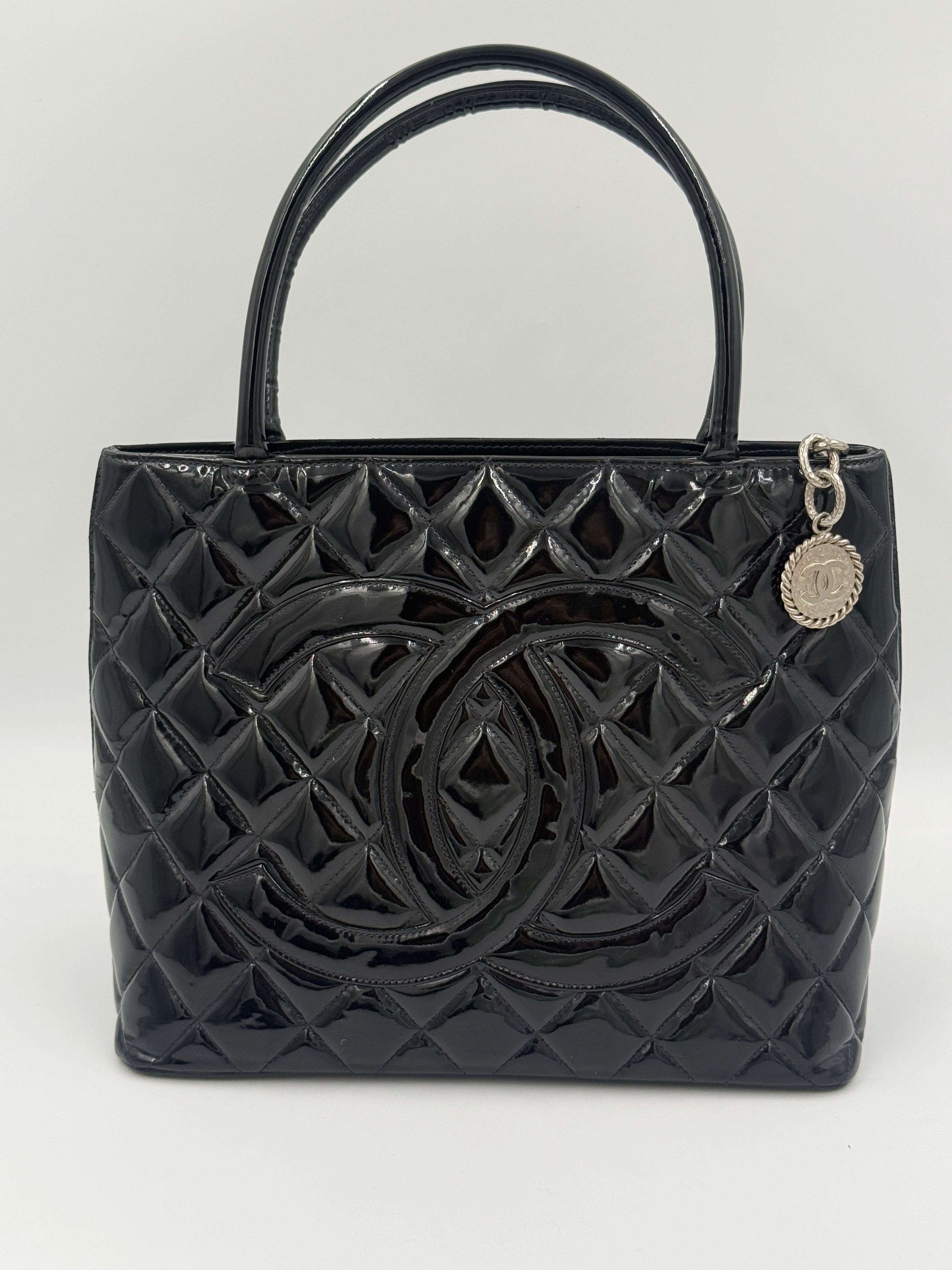 Pre-Owned Chanel Black Quilted Patent Leather Medallion Tote Bag with Silver Hardware - Authenticated