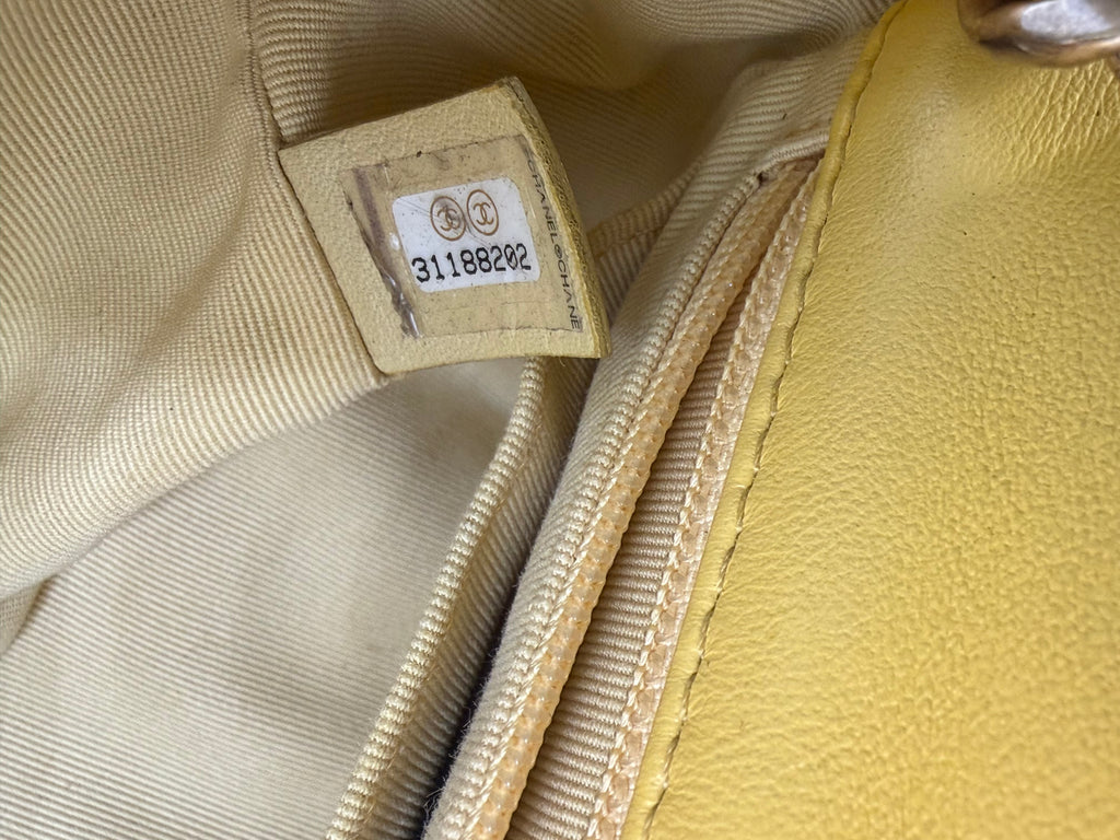 Pre-owned Chanel Yellow Leather Matelassé Handbag with Gem-Toned Charm Chain - Authenticated