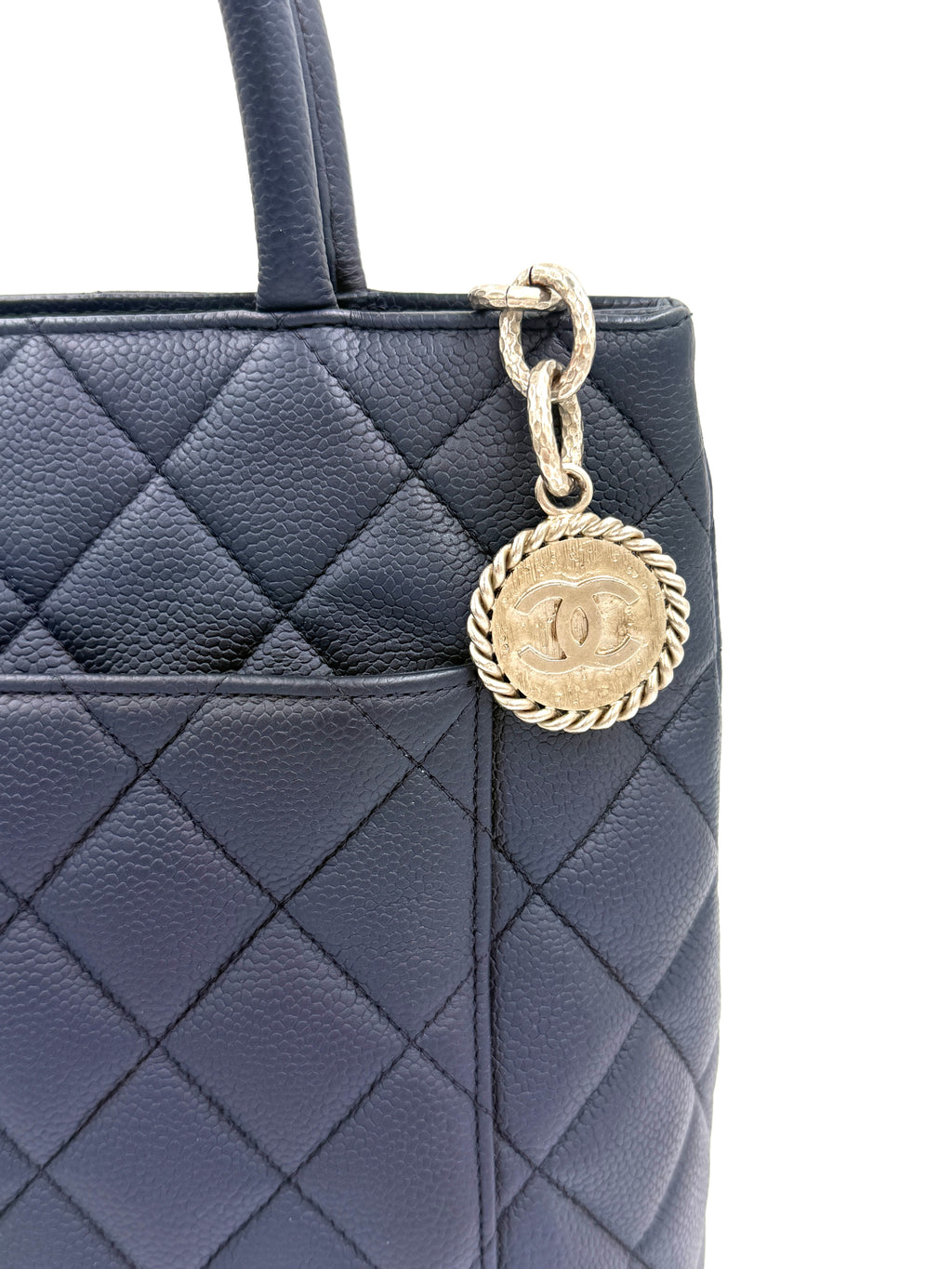 Pre-Owned Chanel Quilted Caviar Leather Navy Medallion Tote Silver Hardware - Authenticated