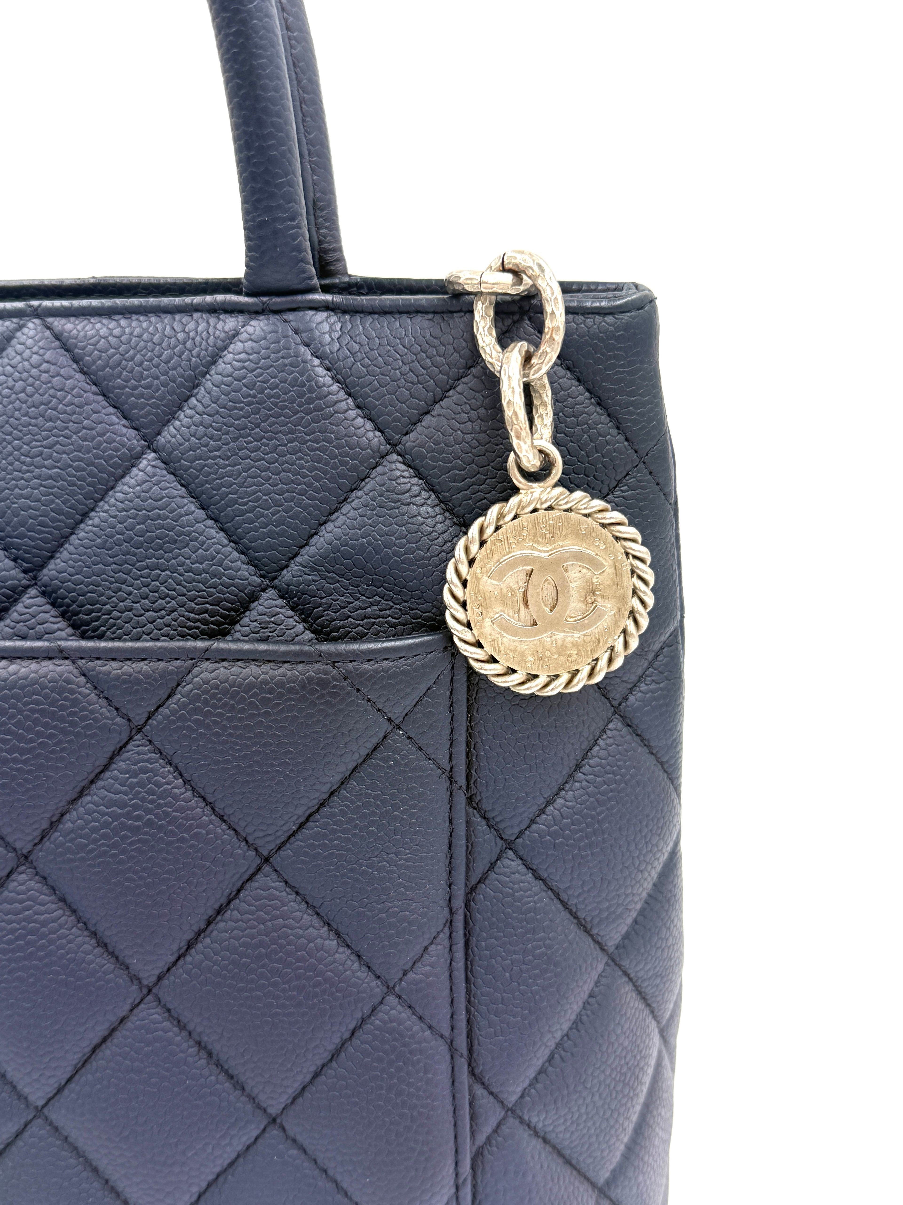 Pre-Owned Chanel Quilted Caviar Leather Navy Medallion Tote Silver Hardware - Authenticated