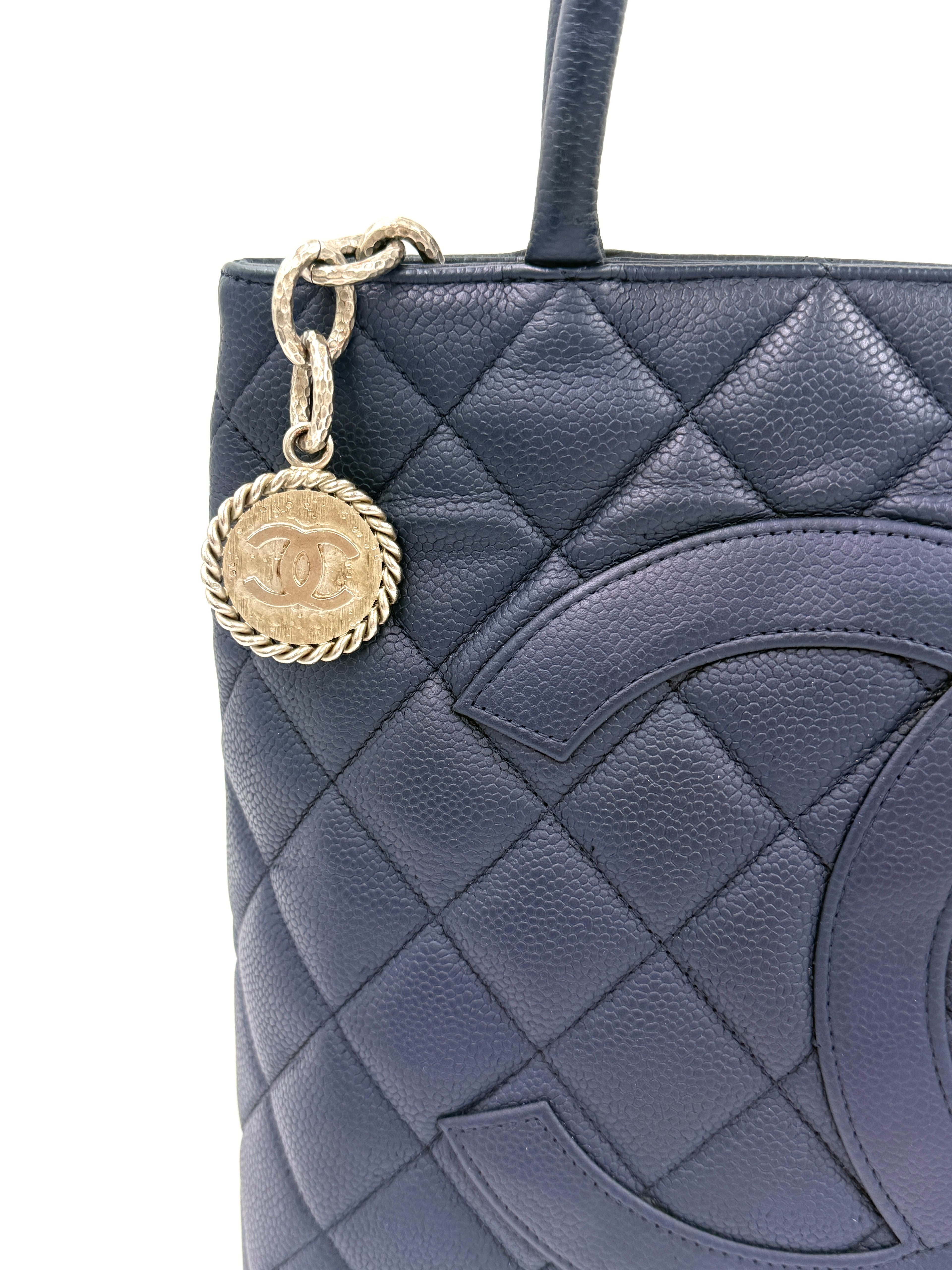 Pre-Owned Chanel Quilted Caviar Leather Navy Medallion Tote Silver Hardware - Authenticated