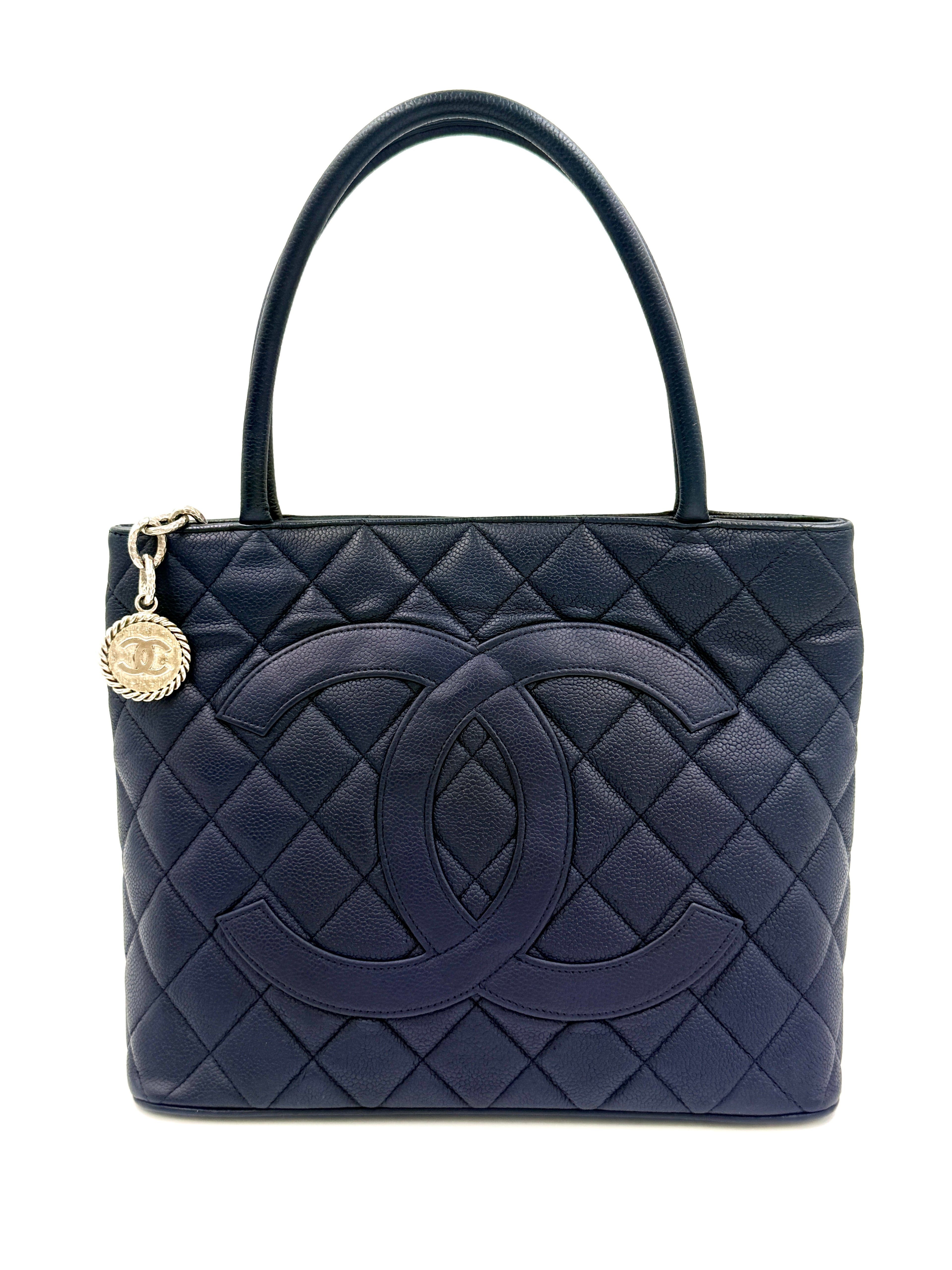 Pre-Owned Chanel Quilted Caviar Leather Navy Medallion Tote Silver Hardware - Authenticated