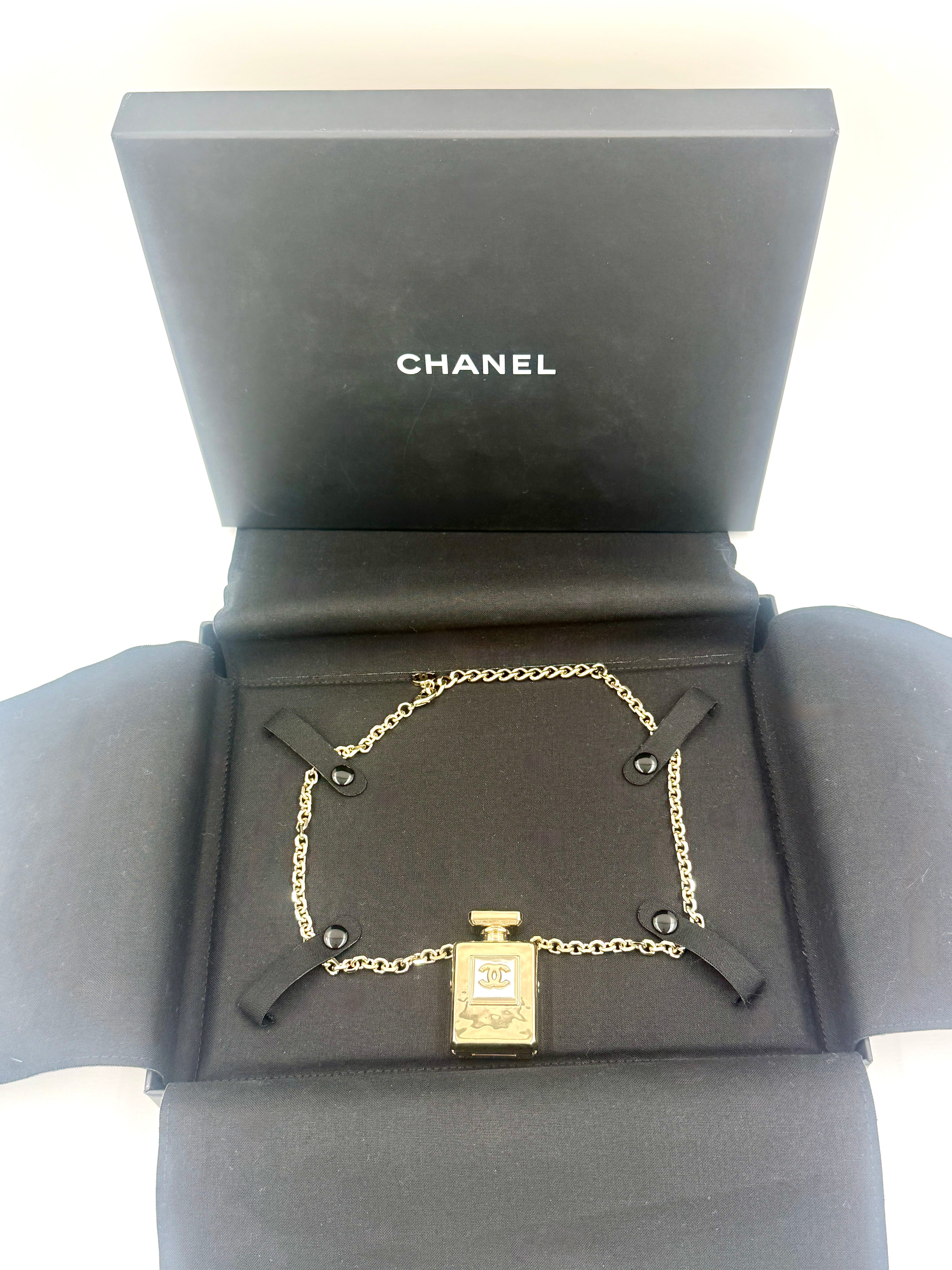 Pre-Owned Chanel 2022 Faux Pearl CC Perfume Bottle Locket Long Pendant Necklace - Authenticated