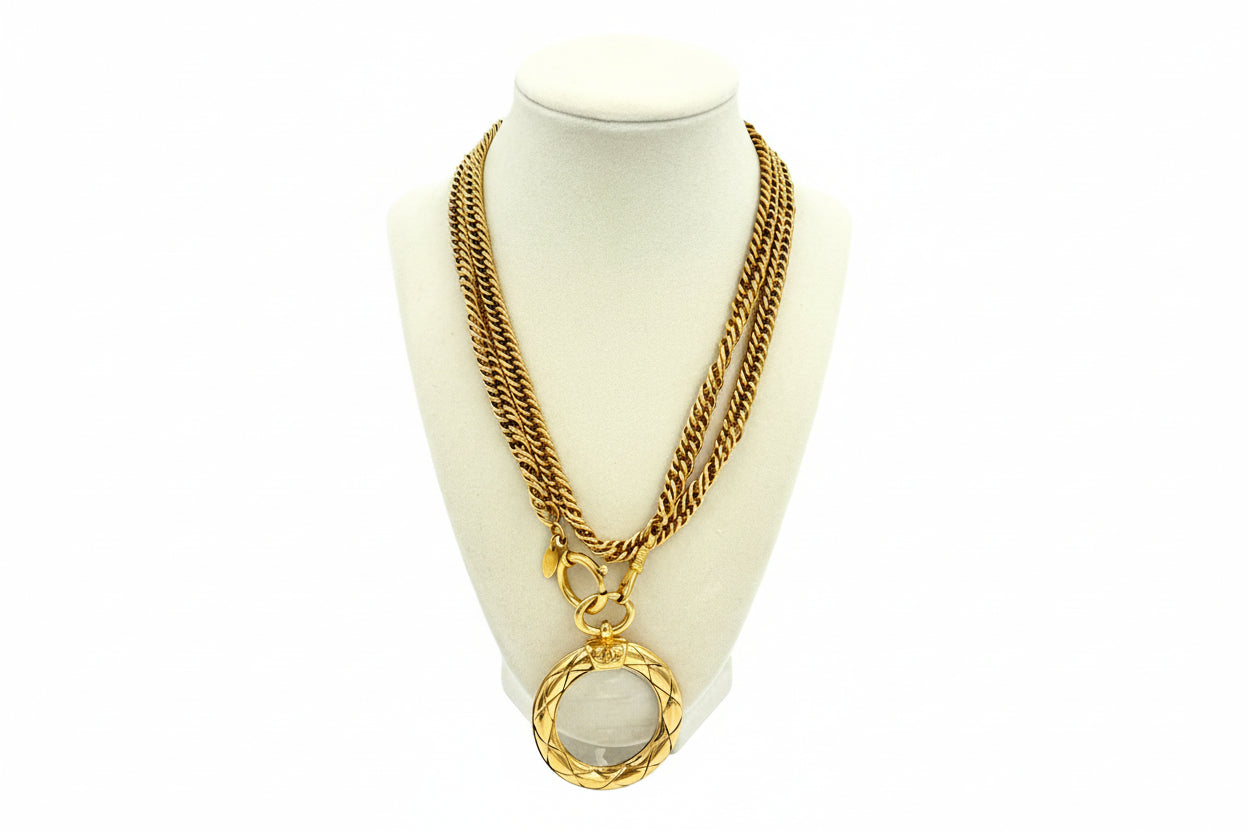 Pre-Owned Chanel Quilted CC Magnifying Glass Pendant Necklace 24k Gold Plated 37" - Authenticated