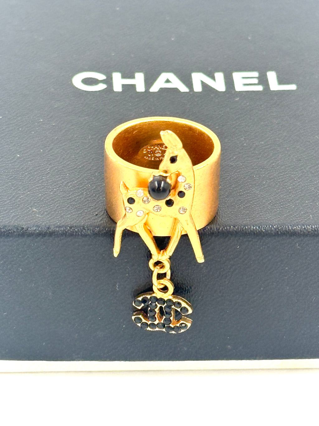Pre-Owned Chanel CC Logo Gold Band Ring Size 7 Black Clear Rhinestone Deer Dangling CC - Authenticated
