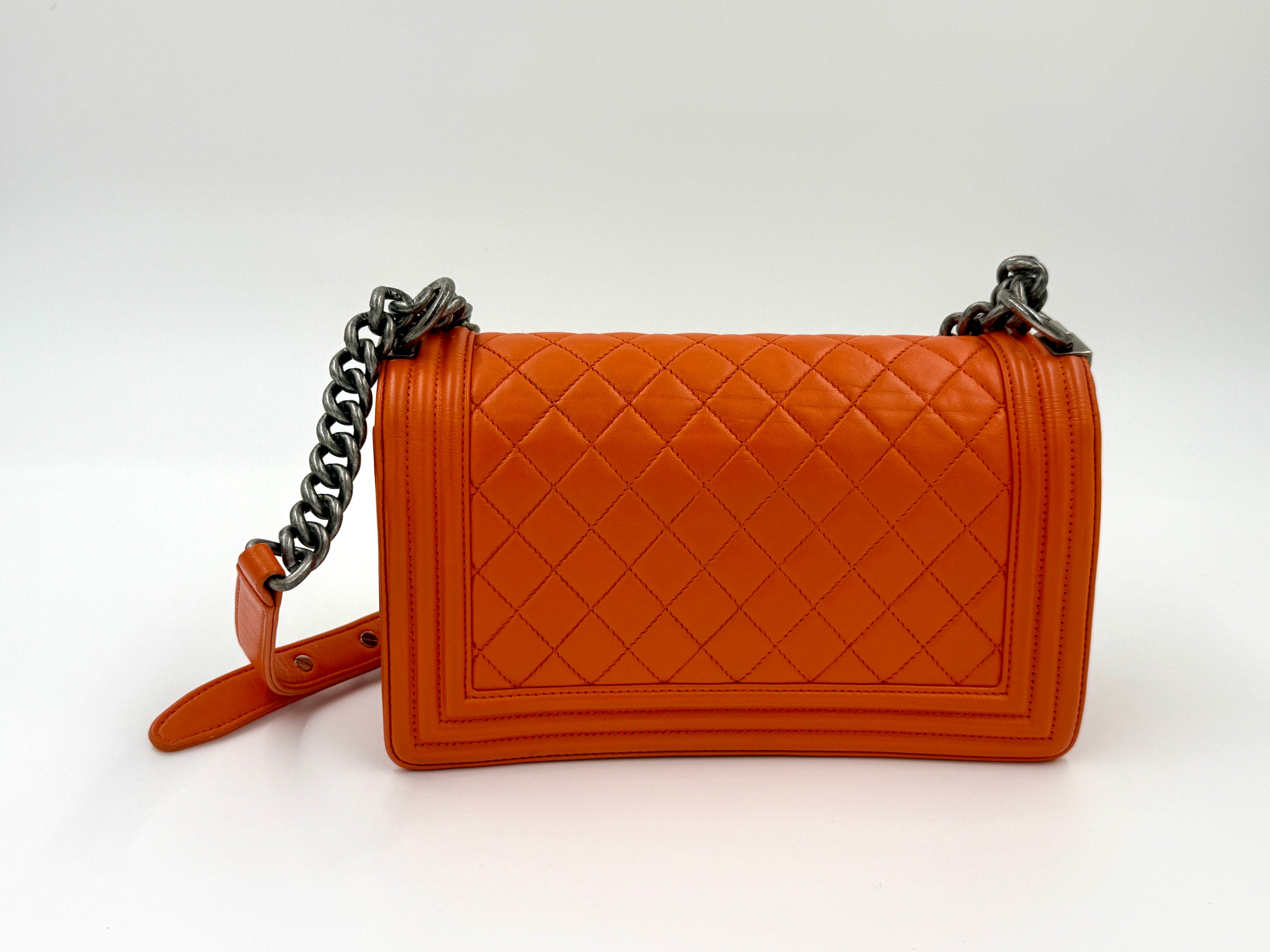 Pre-Owned Chanel Orange Boy Bag with Ruthenium Hardware Old Medium - Authenticated