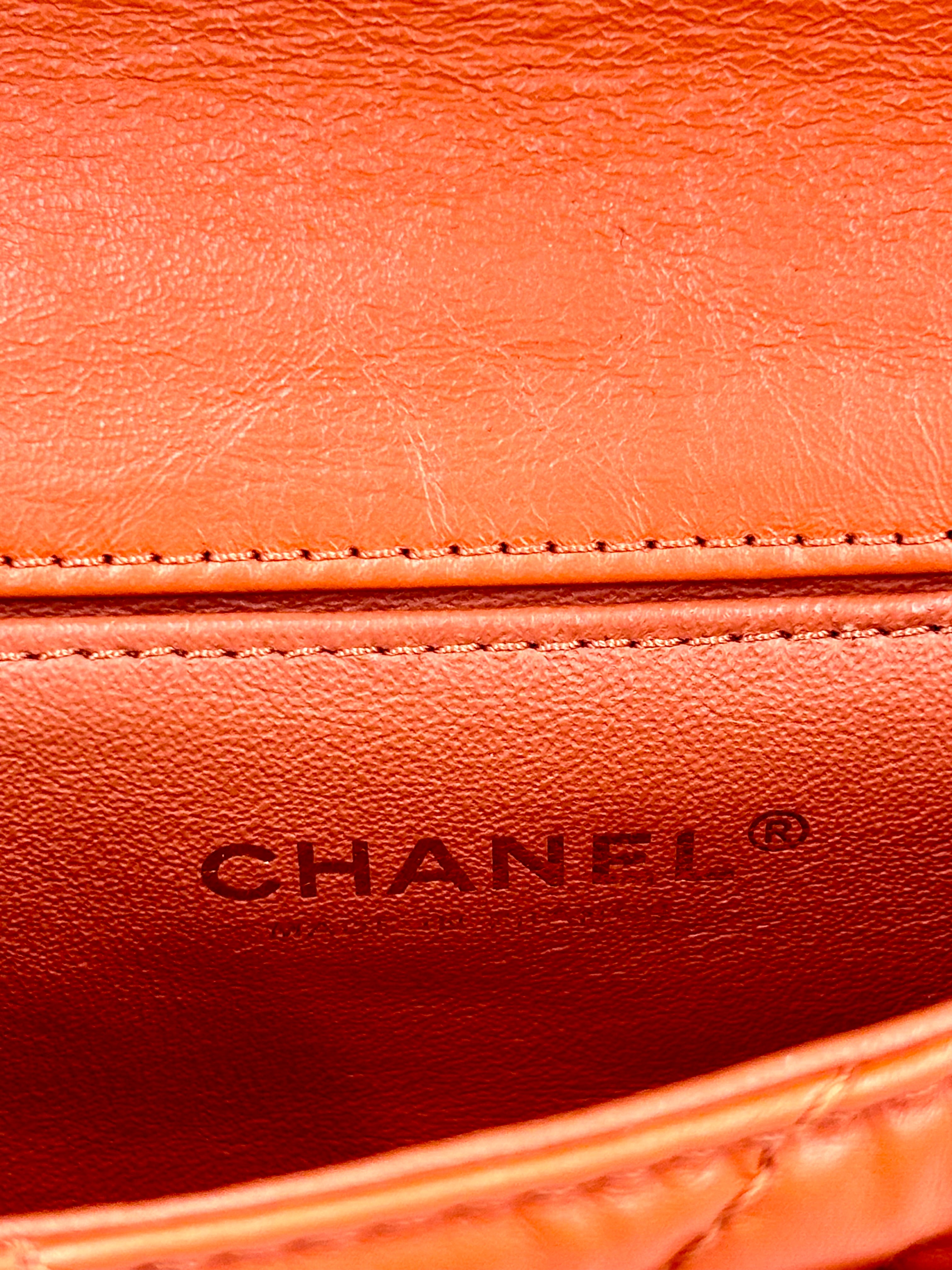 Pre-owned Chanel 2.55 Reissue Mini Flap Bag in Orange Crinkled Calfskin - Authenticated