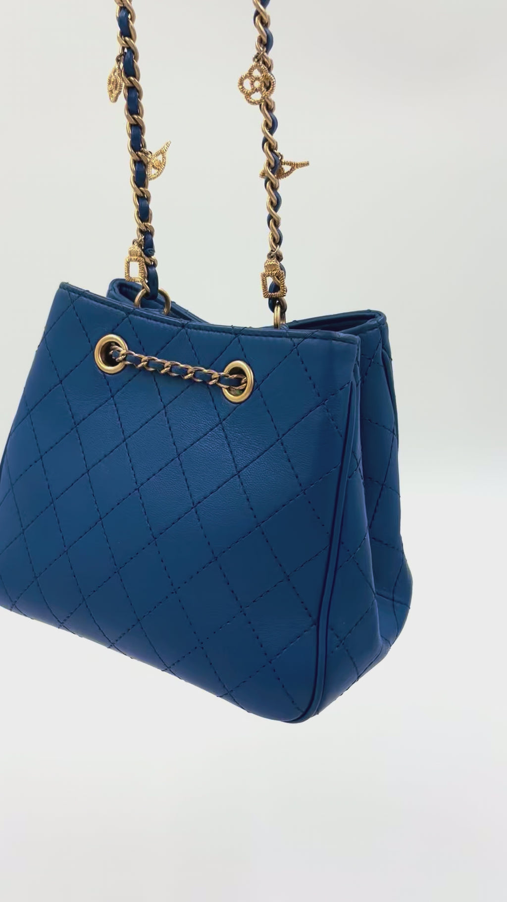 Pre-owned Chanel Blue Stitched Calfskin Egyptian Amulet Drawstring Bucket Bag - Authenticated