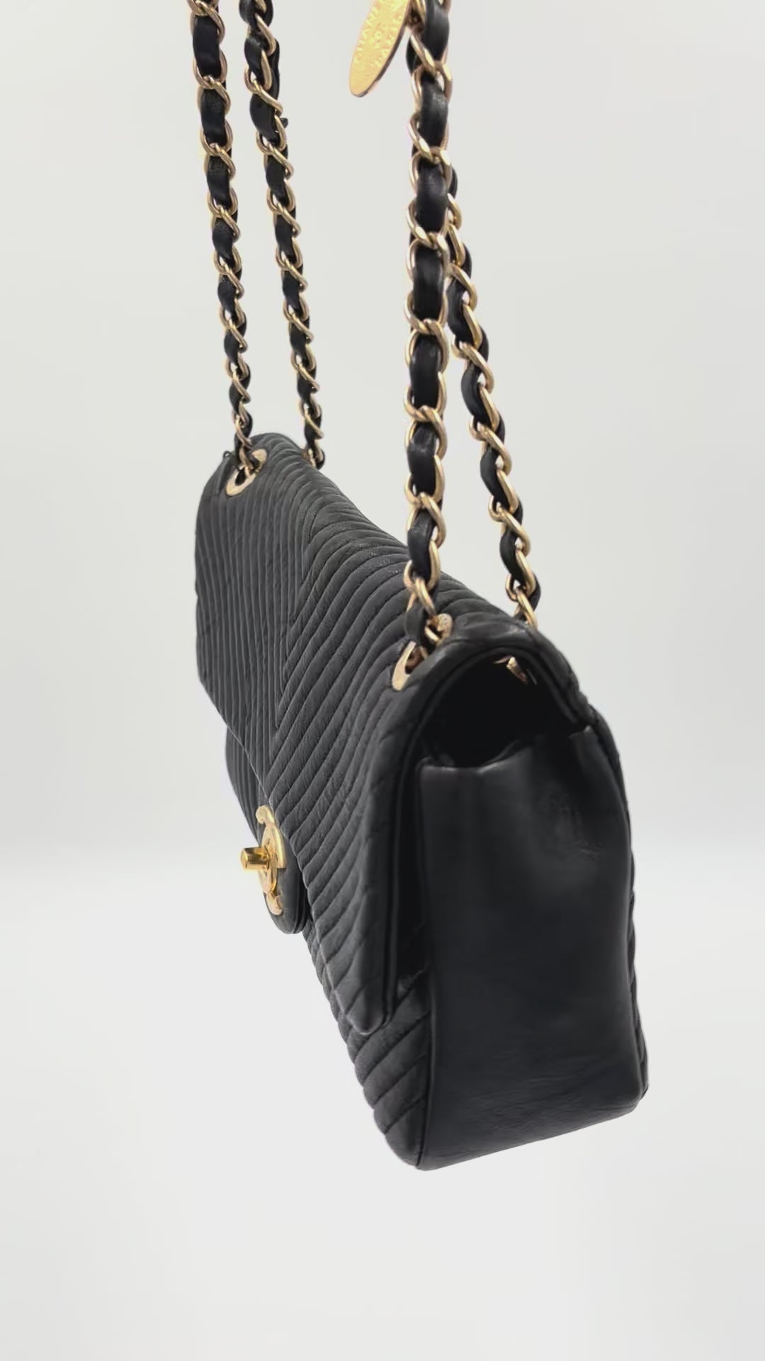 Pre-owned Chanel Medium Surpique Chevron Flap bag Black Gold-Tone Hardware - Authenticated
